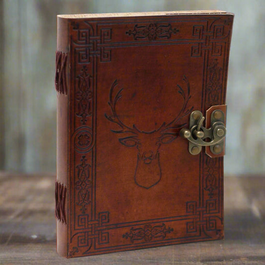 Antiqued leather journal with buckle/clasp, burnt edges and 200 eco-friendly pages. Notebook, diary or sketchbook—shop Fae Cottage.