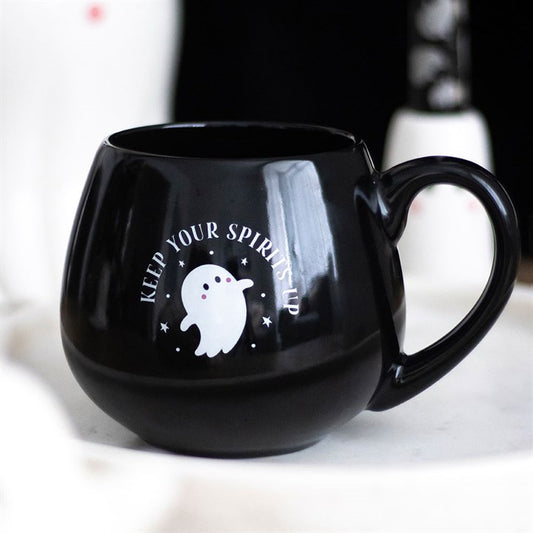 Black mug with a ghost design and text on a white background