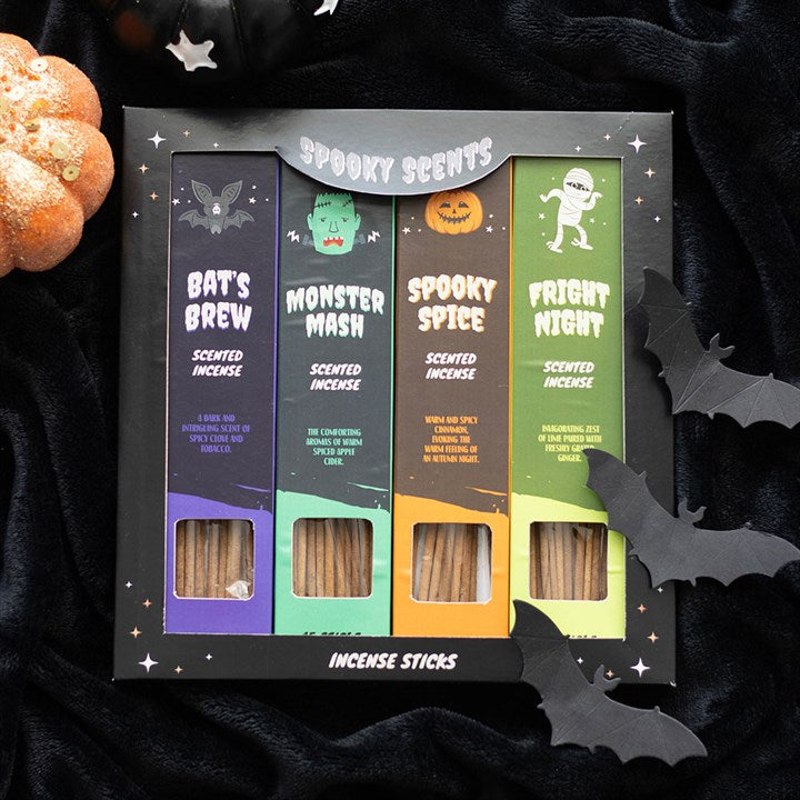 Halloween-themed incense sticks set with colorful packaging on a dark background