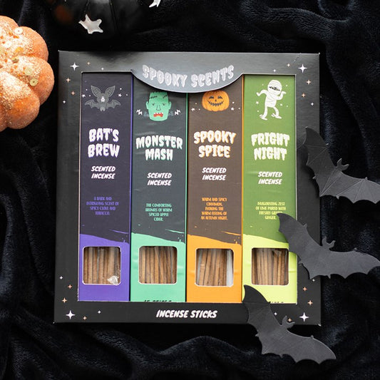 Halloween-themed incense sticks set with colorful packaging on a dark background