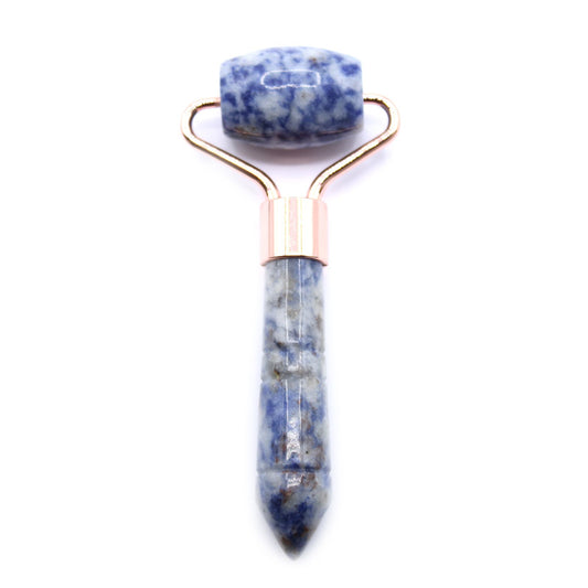 Sodalite stone face roller, finished with rose gold tone.