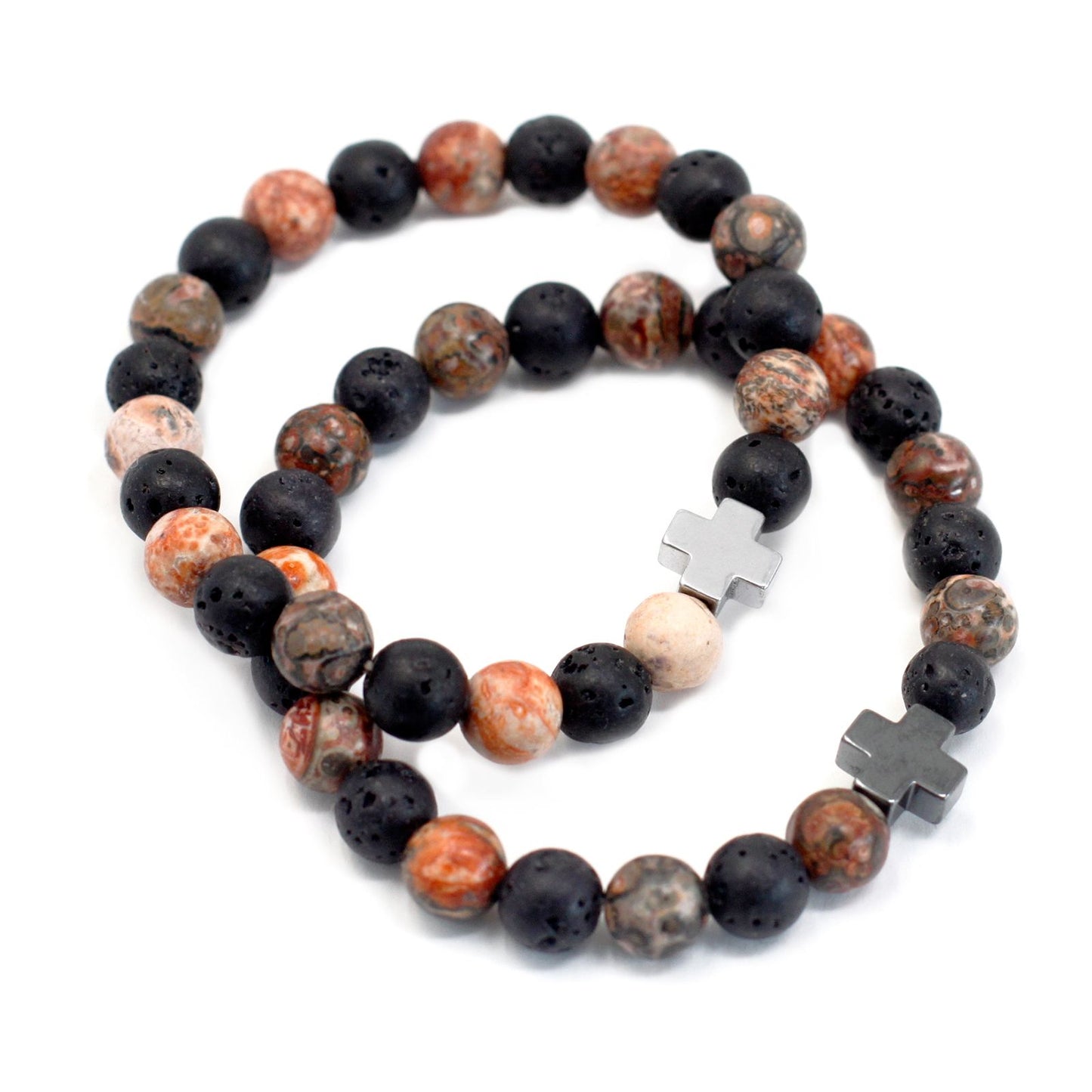 Close-up of two stretch bracelets with 8 mm leopard jasper and black lava beads with silver cross spacers
