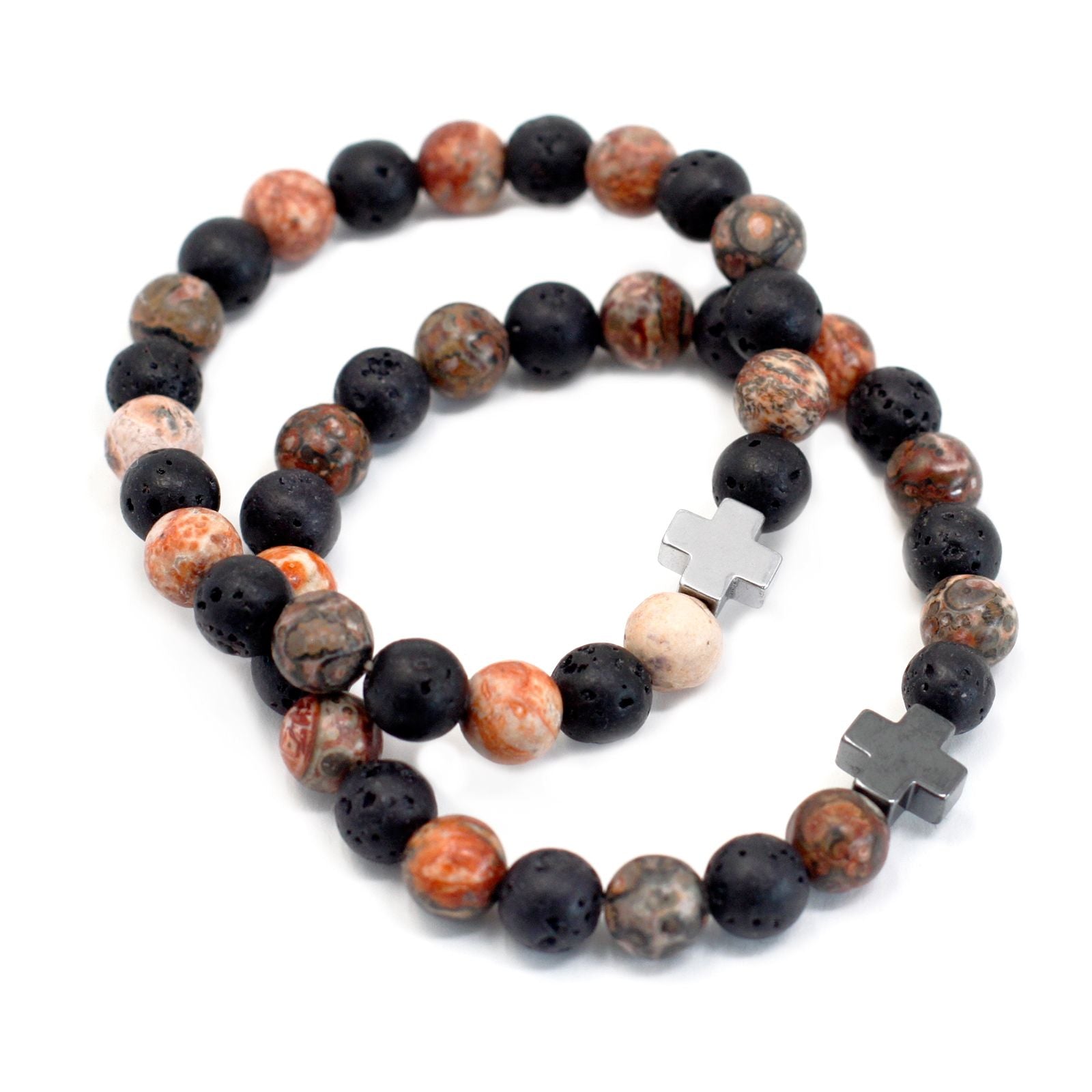 Close-up of two stretch bracelets with 8 mm leopard jasper and black lava beads with silver cross spacers