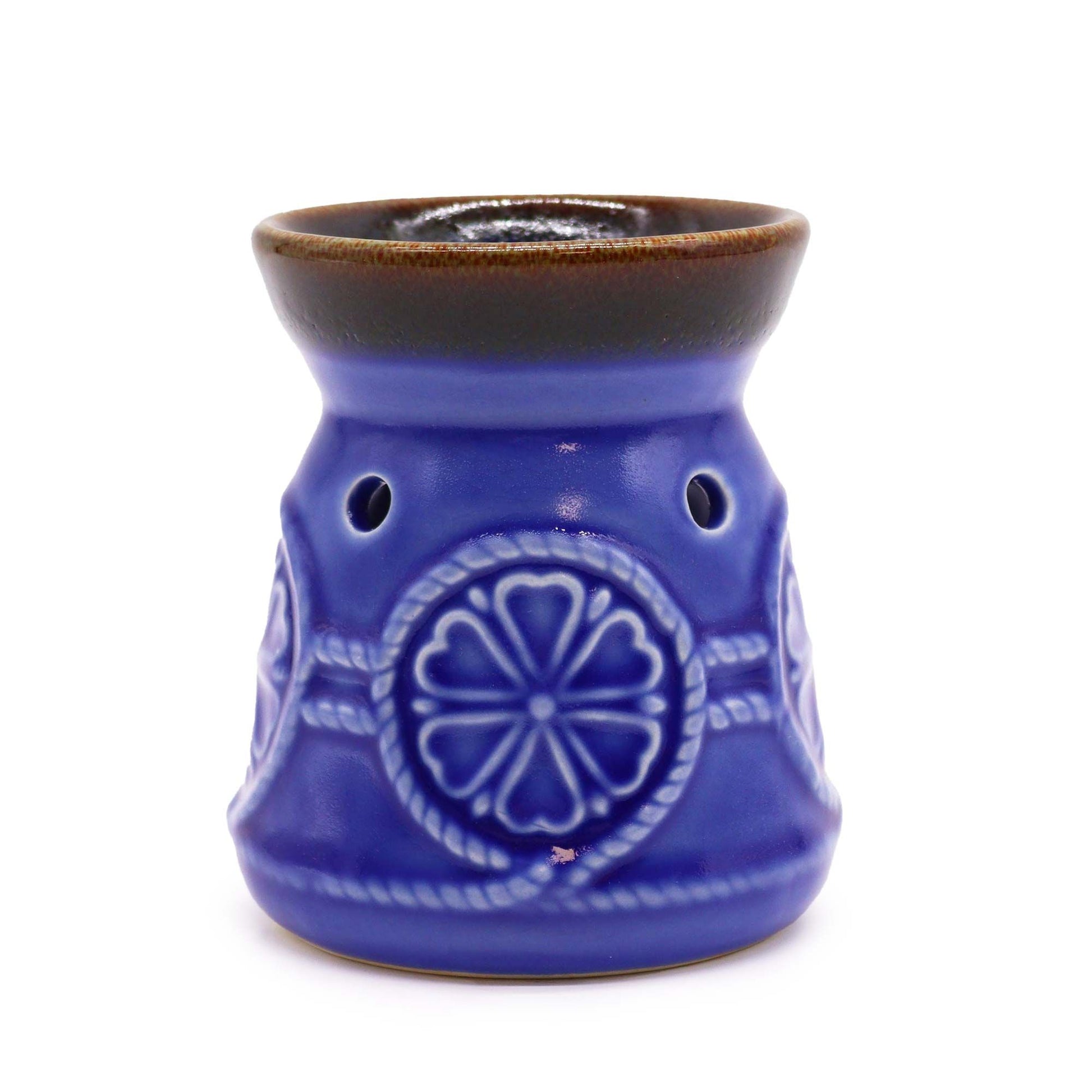 Back view of blue oil burner showing floral rope relief pattern.