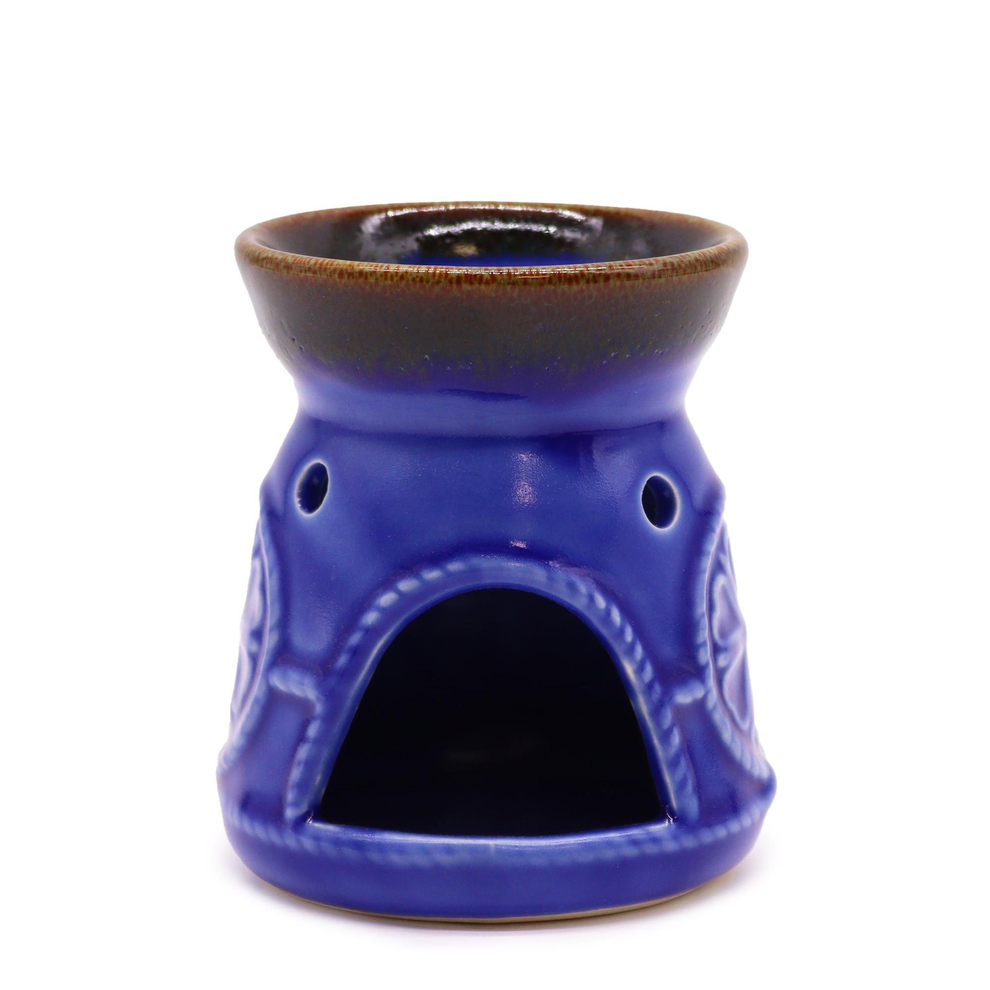 Front view of blue oil burner showing arched tealight opening.