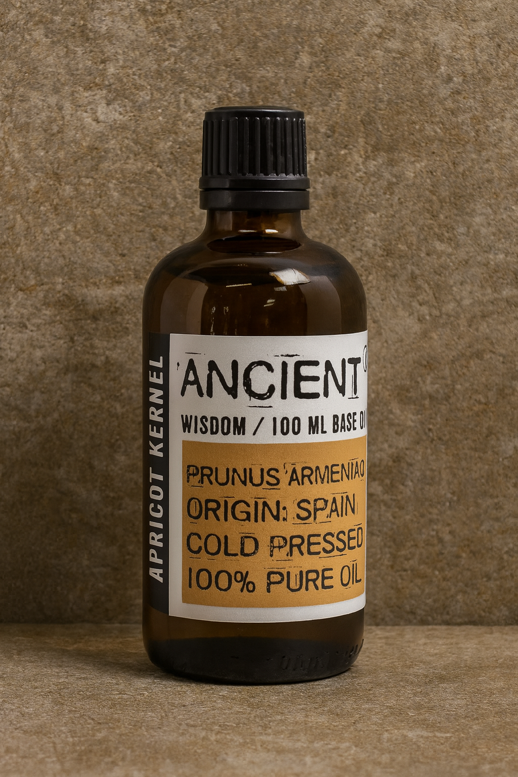Amber glass bottle with black cap labelled ‘Apricot Kernel—cold-pressed’; pale yellow, nearly scentless carrier oil from Spain.