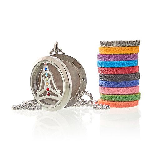 Round 30 mm stainless-steel locket pendant with a yoga/chakra cut-out and rainbow stones on a silver ball chain; coloured felt pad inside to diffuse essential oils.