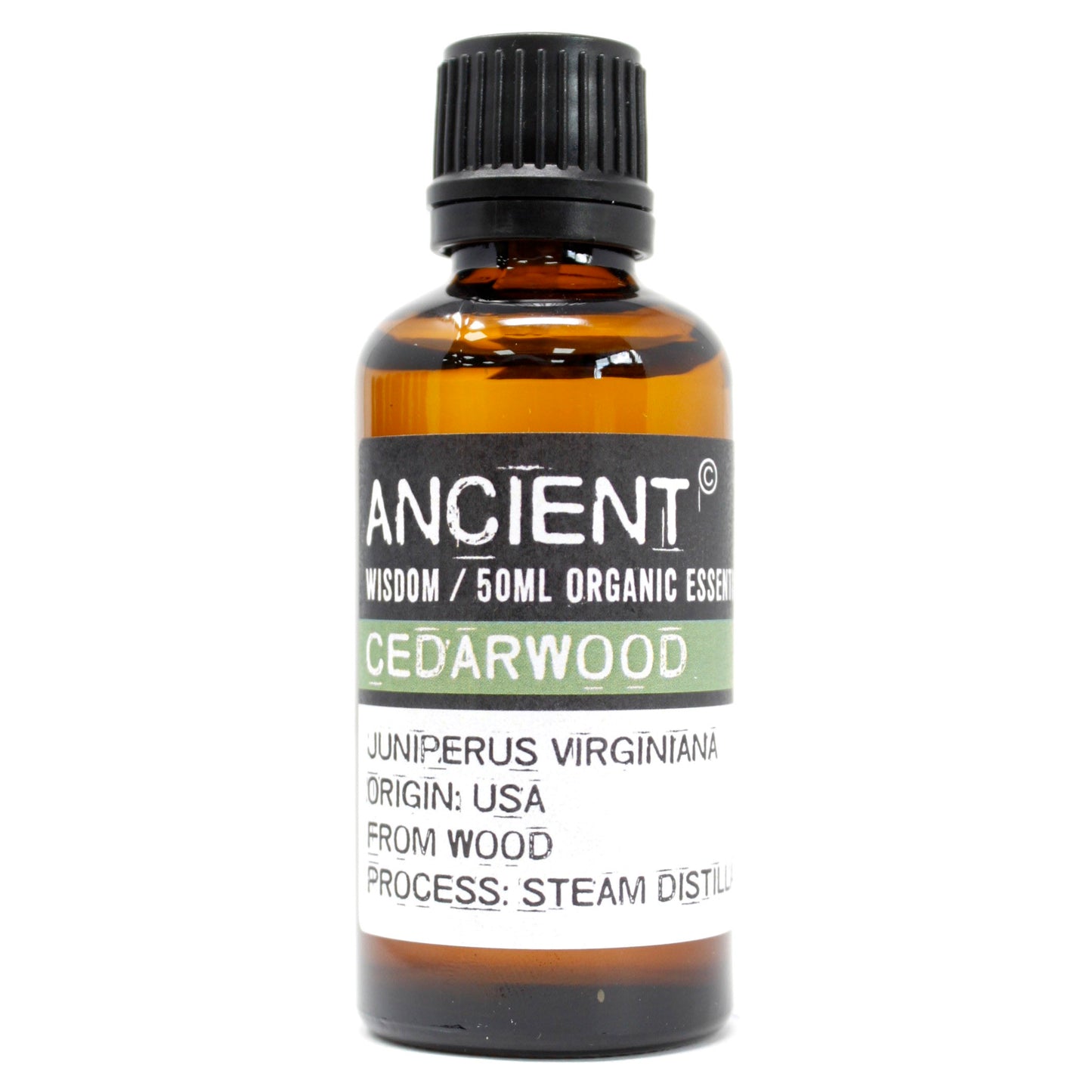 Amber 50 ml bottle labelled ‘Cedarwood—organic, steam-distilled’, a warm woody essential oil for grounding diffusers and DIY room sprays.