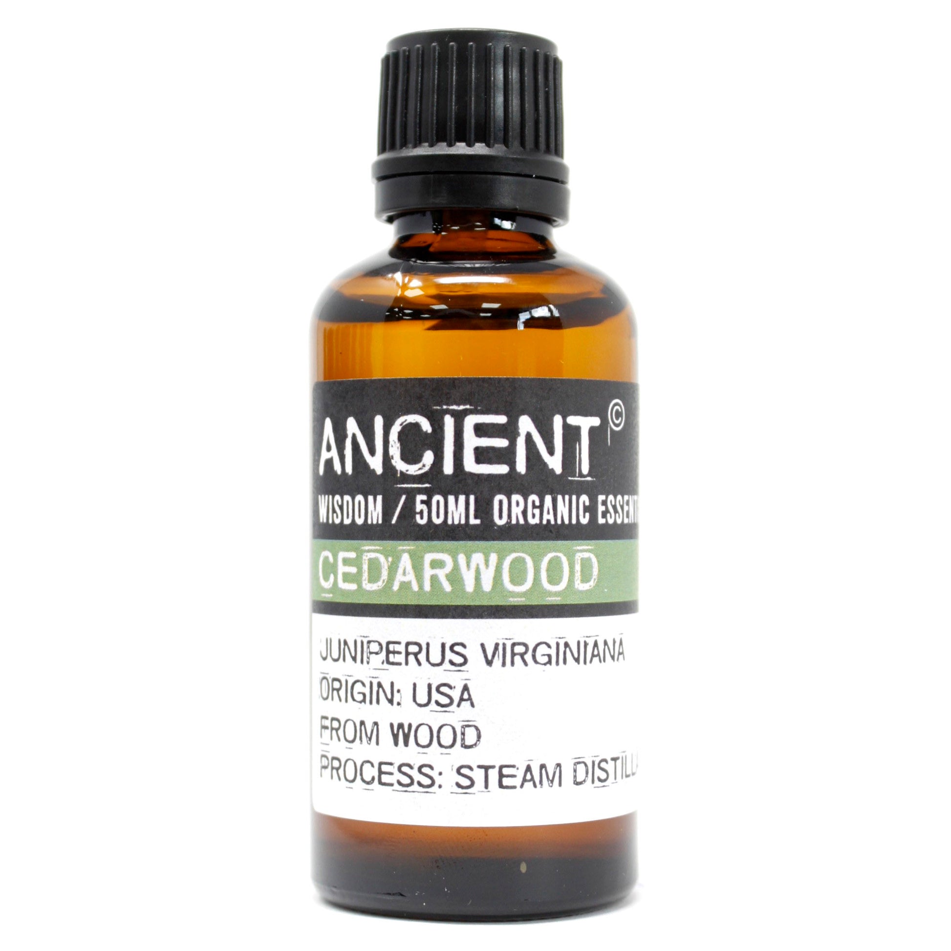 Amber 50 ml bottle labelled ‘Cedarwood—organic, steam-distilled’, a warm woody essential oil for grounding diffusers and DIY room sprays.