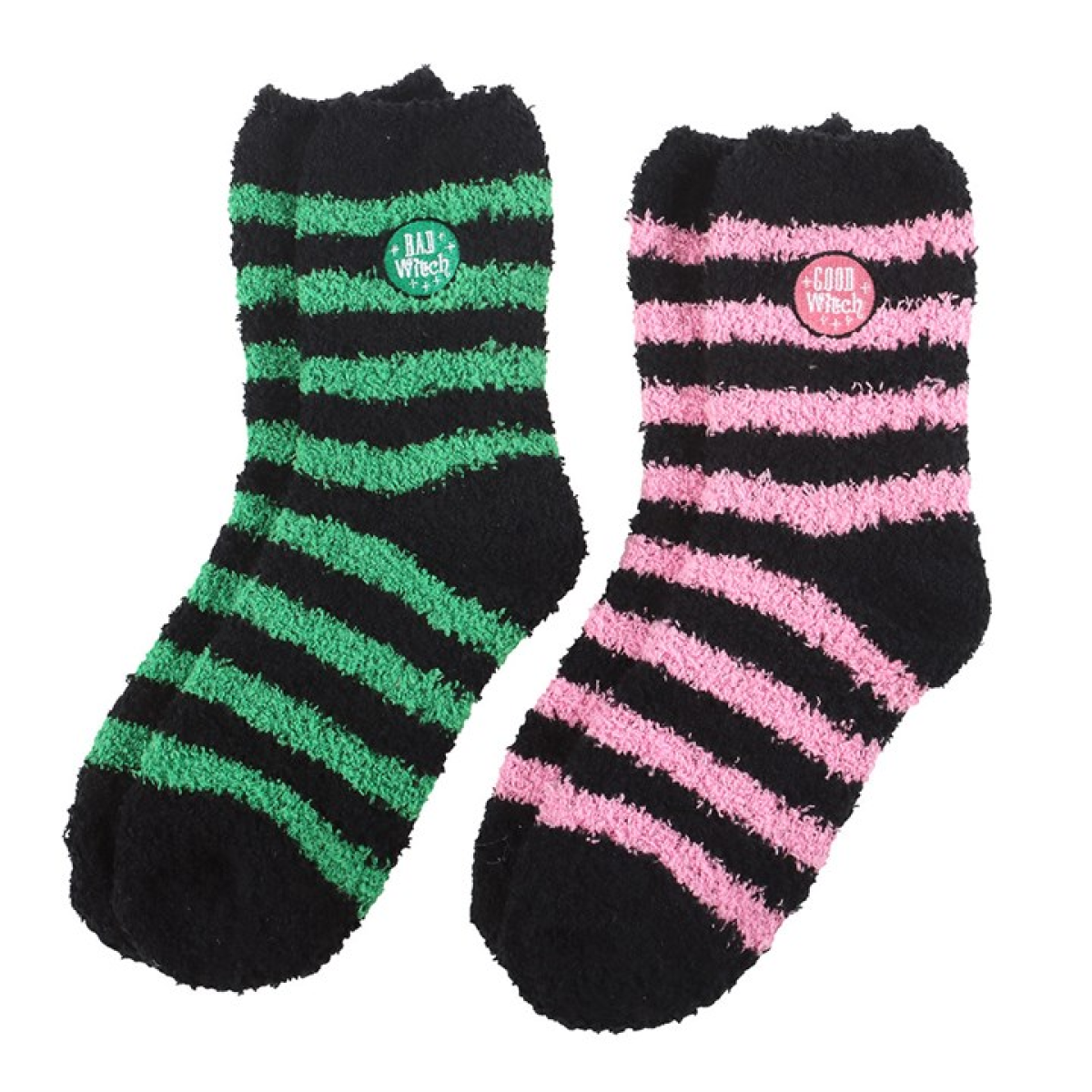 Two pairs of fluffy striped socks in black/pink and black/green with “Good Witch” and “Bad Witch” badges