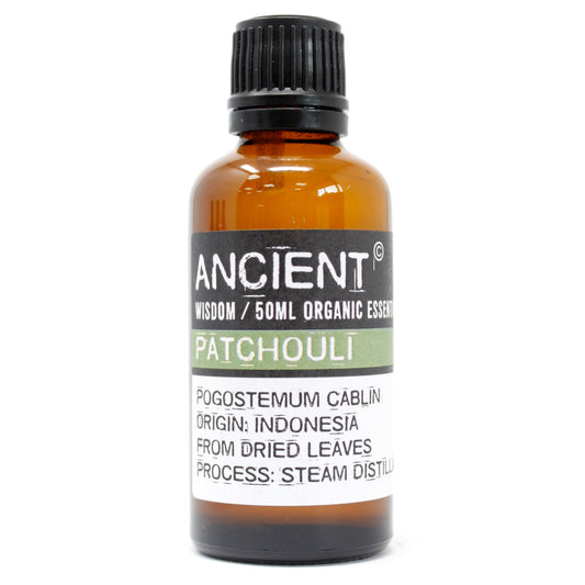 Steam-distilled patchouli essential oil in a 50 ml amber bottle—an earthy, musky base note for grounding blends and natural perfume