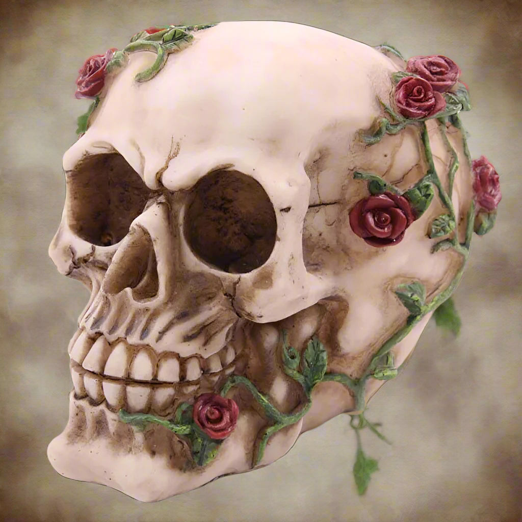 Decorative skull with roses and greenery on a gradient background