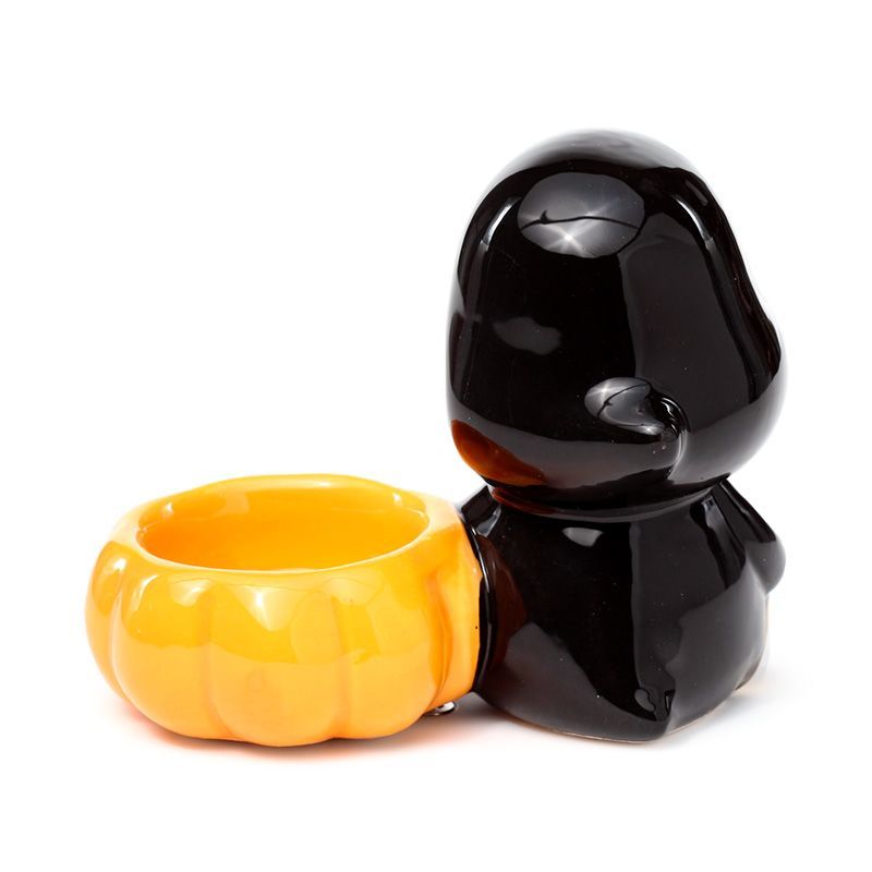 Rear view showing the round pumpkin bowl opening for a standard tea light.