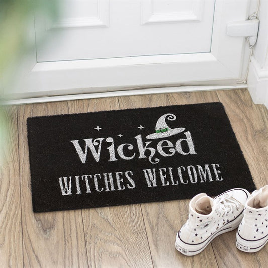 wicked witches welcome black mat infront of a door