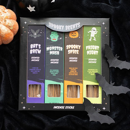 Halloween-themed incense sticks set with colorful packaging on a dark background