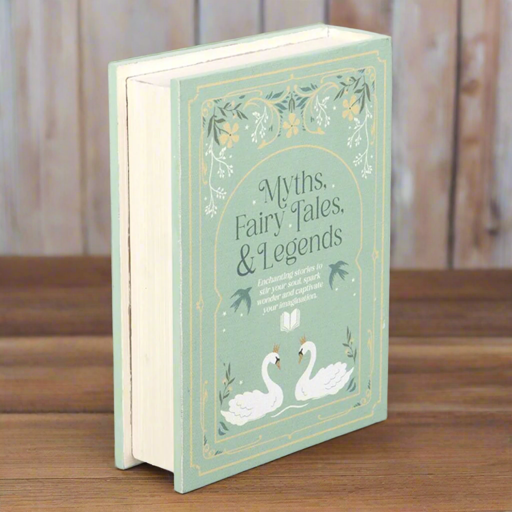 Decorative book-shaped box with 'Myths, Fairy Tales & Legends' text and swan illustrations on a light green background - Fae Cottage