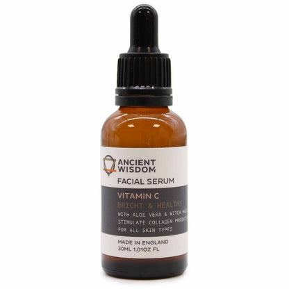 Facial serum bottle with dropper labeled 'Ancient Wisdom' on a white background