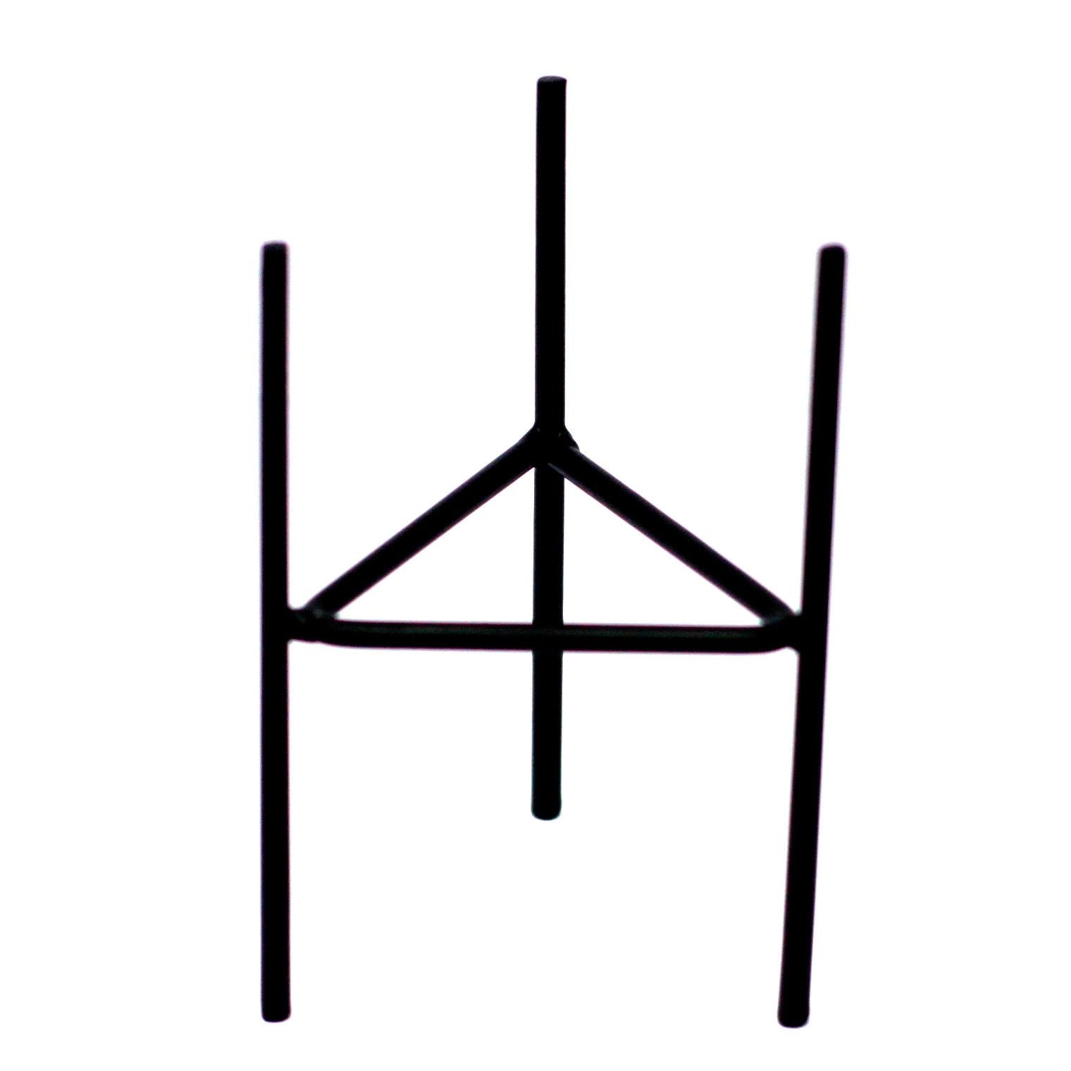 Black metal stand on a white background