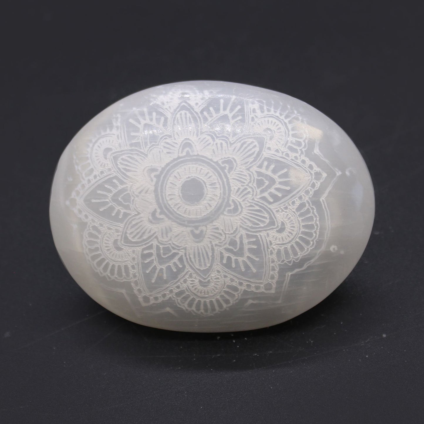 Selenite Palm Stone — Mandala Engraved Moonlight
