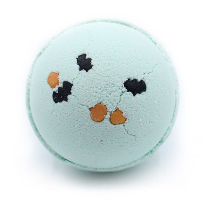 Mint-green spherical Halloween bath bomb with black bat and orange pumpkin sprinkles; coconut & lime scent; handmade in the UK.