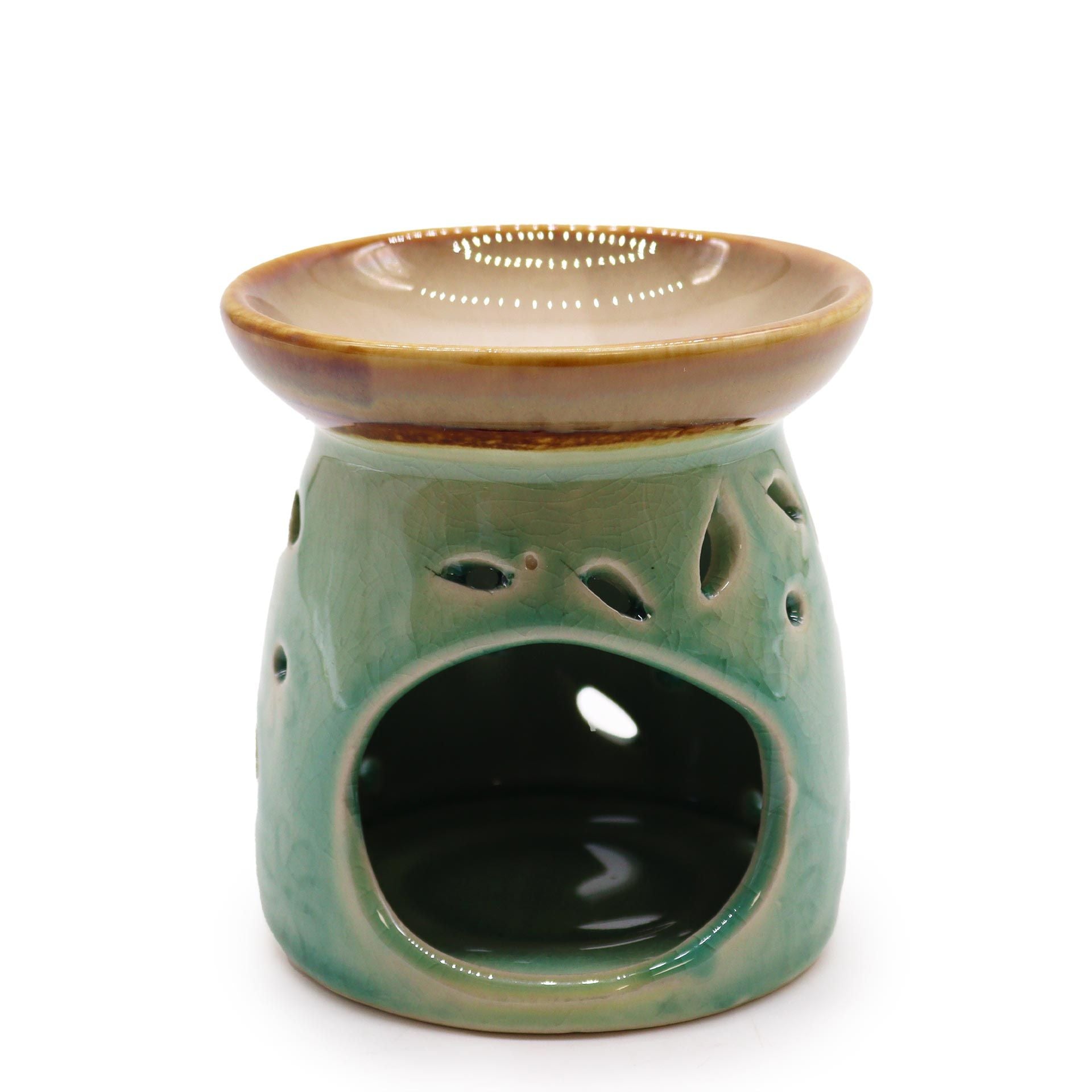 Front view of the classic blue ceramic oil burner with wide dish and leaf cut-outs.