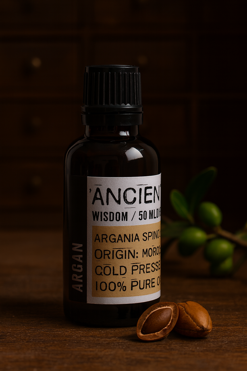 Amber glass bottle with black cap labelled ‘Argan—cold-pressed’; a light-to-golden Argania spinosa kernel oil from Morocco with a mild nutty-sweet aroma and satin, quick-settling glide for face, body and hair.