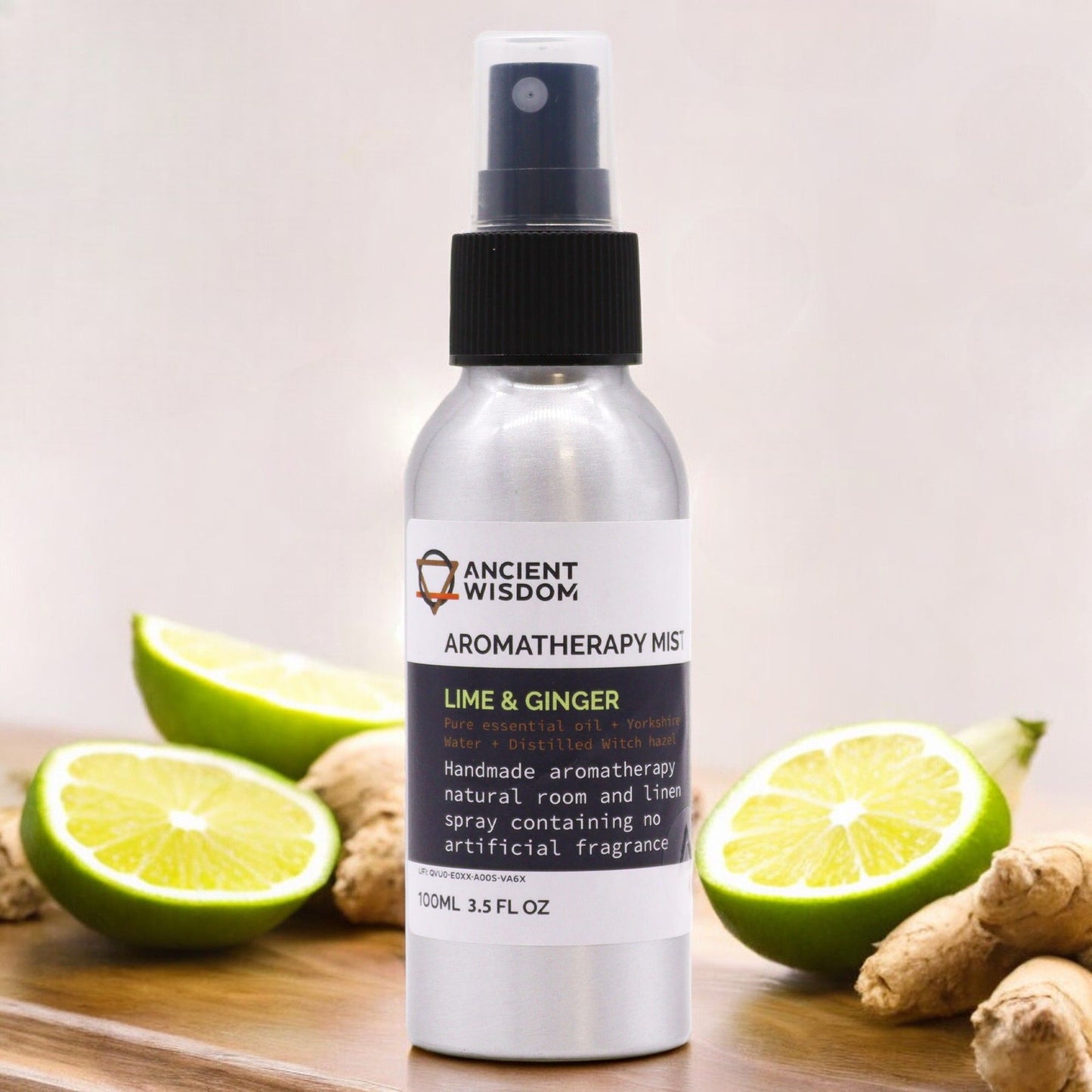 “Brushed-aluminium spray bottle with black atomiser labelled ‘Aromatherapy Mist—Lime & Ginger’; a natural room and linen spray made with Yorkshire water, distilled witch hazel, lime peel and ginger root essential oils.