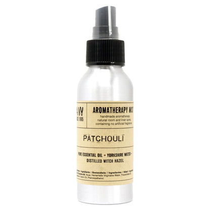 Brushed-aluminium spray bottle with black atomiser labelled ‘Aromatherapy Mist—Patchouli’; a natural room and linen spray made with Yorkshire water, distilled witch hazel and patchouli essential oil.