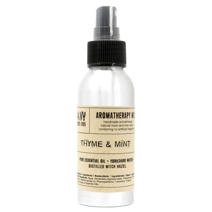 Brushed-aluminium spray bottle with black atomiser labelled ‘Aromatherapy Mist—Thyme & Mint’; a natural room and linen spray made with Yorkshire water, distilled witch hazel, thyme and spearmint essential oils.