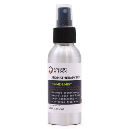 Brushed-aluminium spray bottle with black atomiser labelled ‘Aromatherapy Mist—Thyme & Mint’; a natural room and linen spray made with Yorkshire water, distilled witch hazel, thyme and spearmint essential oils.