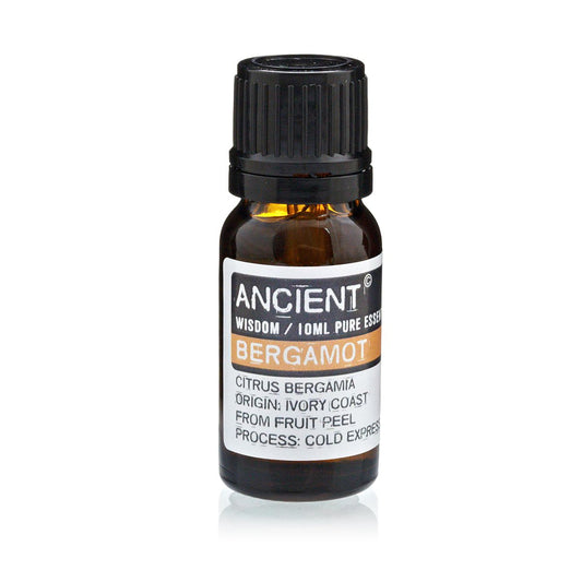 Amber 10 ml bottle labelled ‘Bergamot—pure essential oil’, a cold-expressed, bright citrus aroma with Earl Grey nuance for uplifting diffusers and room mists.
