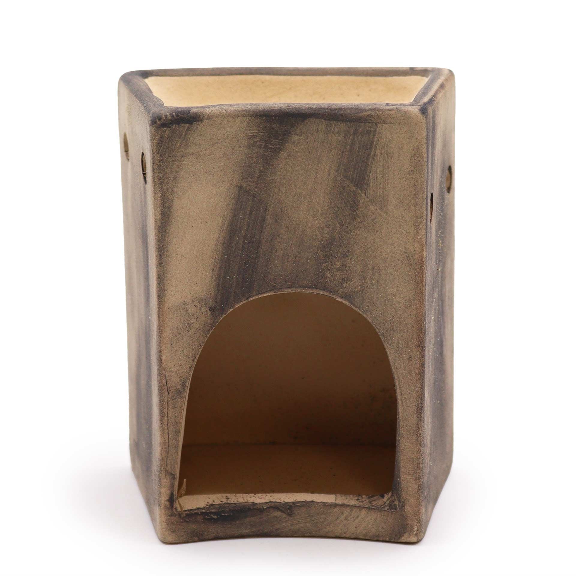 Back view of ceramic oil burner showing tealight opening.