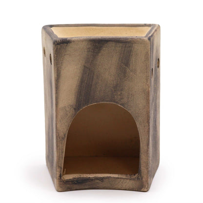 Back view of ceramic oil burner showing tealight opening.