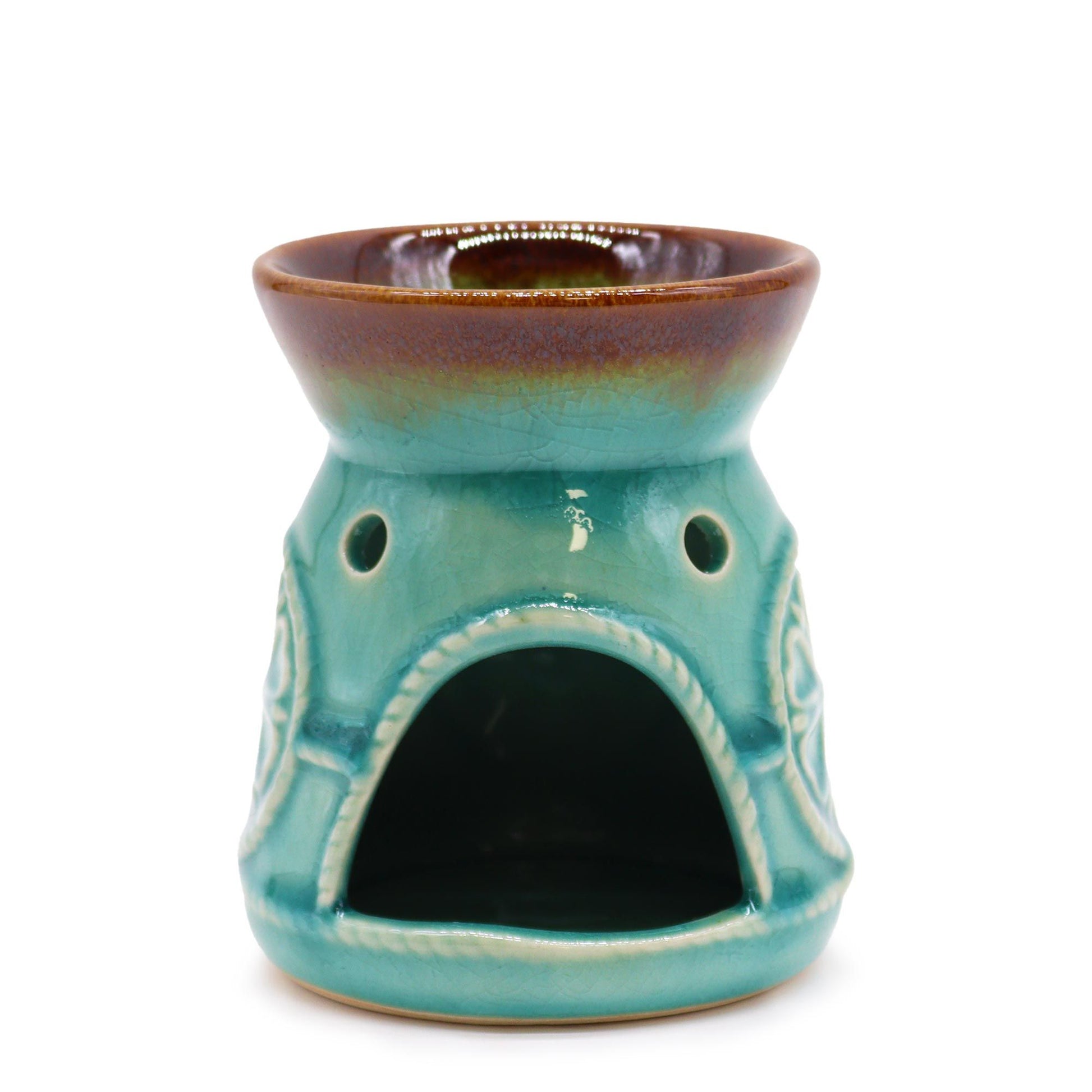 Front angle showing the tealight opening of the turquoise ceramic oil and wax melt burner.