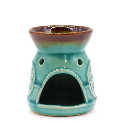 Front angle showing the tealight opening of the turquoise ceramic oil and wax melt burner.