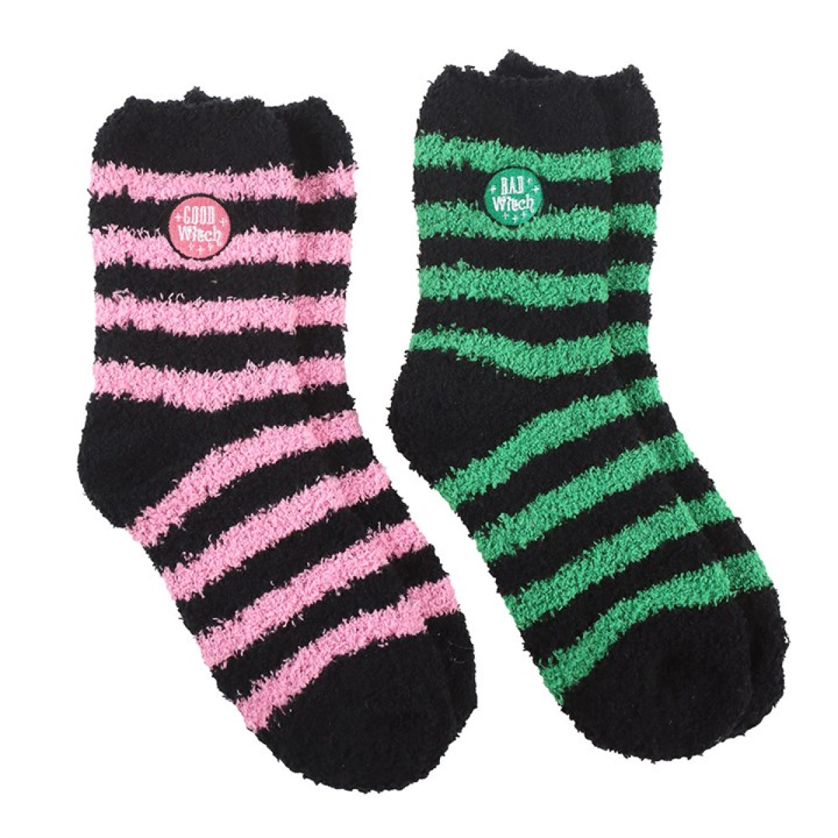 Two pairs of fluffy striped socks in black/pink and black/green with “Good Witch” and “Bad Witch” badges