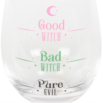 Clear stemless glass with pastel pink “Good Witch,” green “Bad Witch,” and black “Pure Evil” fill lines.