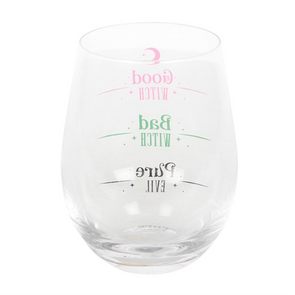 Clear stemless glass with pastel pink “Good Witch,” green “Bad Witch,” and black “Pure Evil” fill lines.