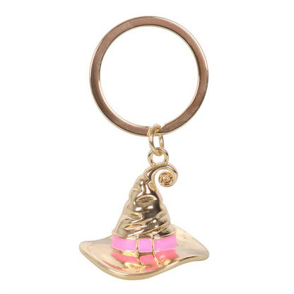Gold-tone witch hat keyring with a pink enamel band, engraved “Good Witch,” shown on a keyring—cute witchy keychain accessory.