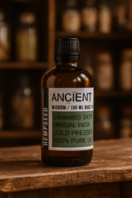 Amber glass bottle with black cap labelled ‘Hemp Seed—cold-pressed’; a leaf-green, lightly nutty Cannabis sativa seed oil from India for lightweight face, body and hair blends.