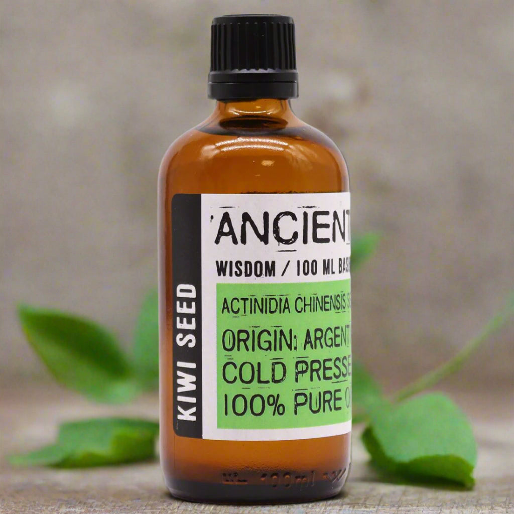 Amber bottle of cold-pressed kiwi seed carrier oil, 100ml, Argentina origin.