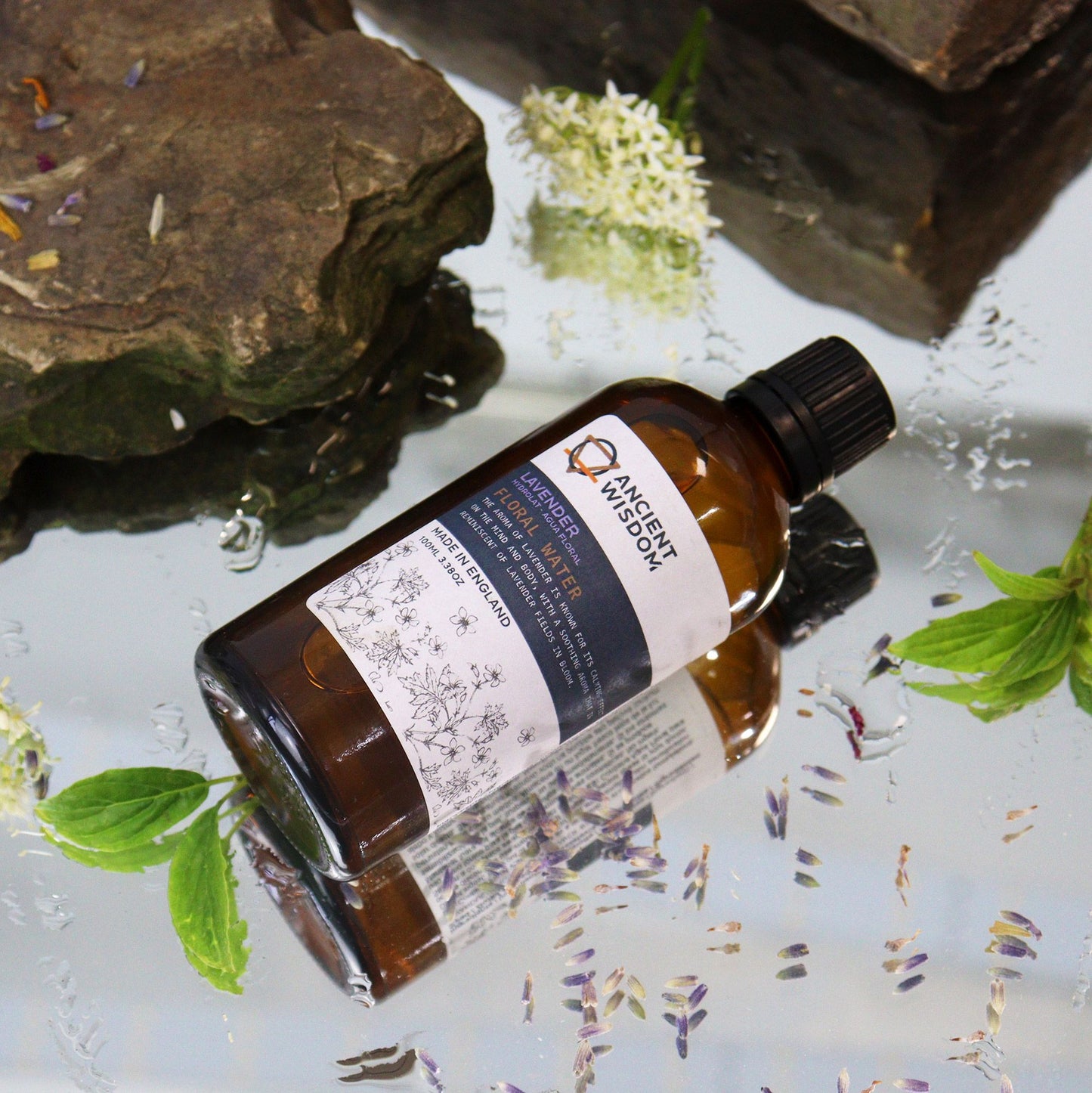 100 ml amber glass bottle labeled ‘Lavender Floral Water’—steam-distilled hydrolat for toners, mists, and DIY skincare.