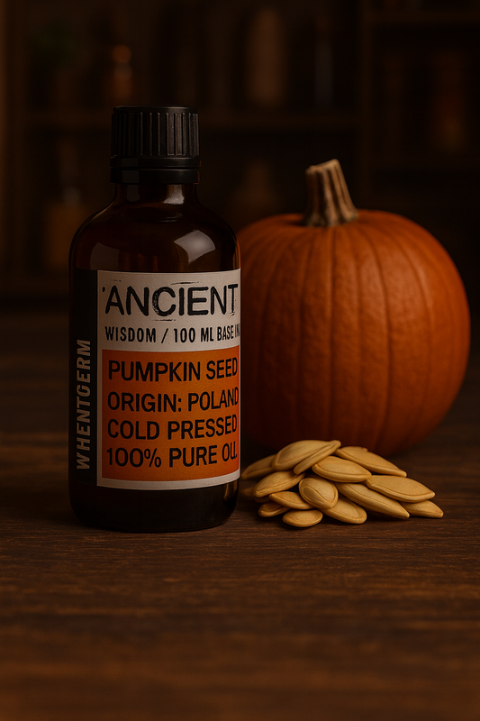 Amber glass bottle with black cap labelled ‘Pumpkin Seed—cold-pressed’; a deep green-to-amber Cucurbita pepo seed oil with a nutty scent and soft, cushioned glide for face, body and scalp blends.