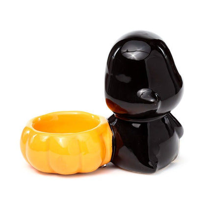 Rear view showing the round pumpkin bowl opening for a standard tea light.