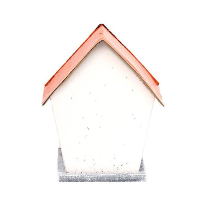 Rear view of pumpkin house LED decoration with plain back panel and orange roof.