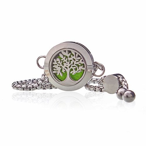 Stainless-steel Tree of Life diffuser bracelet with green felt pad inside a 20 mm locket.