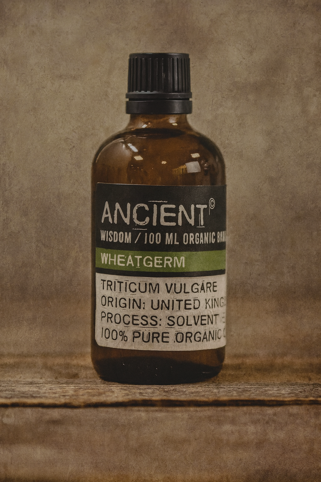 Amber glass bottle labelled ‘Wheatgerm—organic, cold-pressed’; a golden, vitamin-E–rich carrier used as an antioxidant booster for DIY skincare.